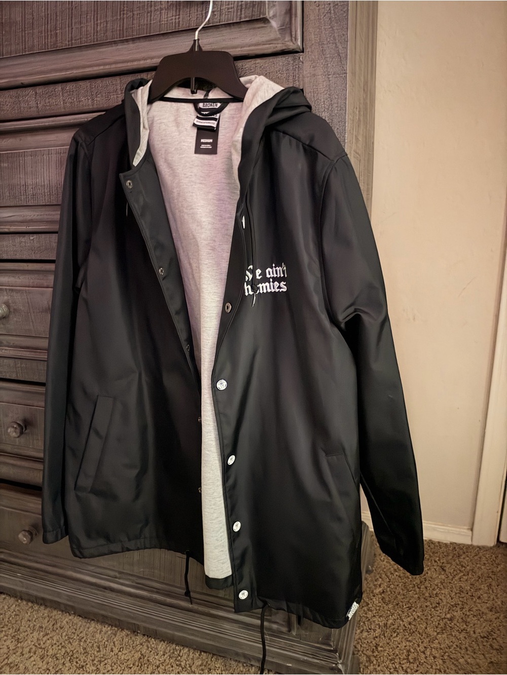 Black Hooded Raincoat Jacket with White Script Logo - No Brand Listed